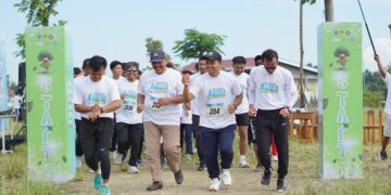 Pemuda LDII Lamongan Gelar Penanaman Pohon dan Jogging Kutip Sampah