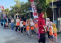 Semarak HUT RI ke-80, Anak-Anak TPQ Baitul Makmur Gelar Jalan Sehat